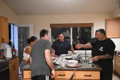 Tama, Mary, Tavo, Paco and Roger getting dinner ready